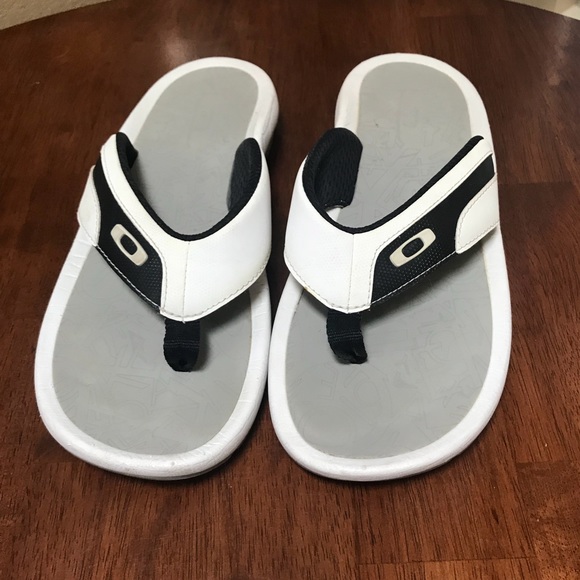 white oakley flip flops